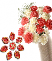 Ethnic Diyas and Pink and White Carnations